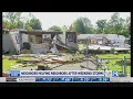 Jenison neighbors help each other clear storm damage