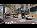 NYC SIM4C Staten Island Manhattan Express Bus a Porsche and boarded up windows on 5th Ave 1hinew