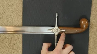 how to fix a loose sword guard with minimal tools