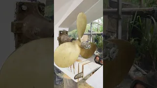 Boat building: cutting the wooden keel and adjusting it to the propeller