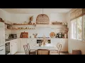 Boho Chic Minimalist Kitchen For Spring With Gold Accents And White Tile on The Walls And Stove