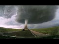 Download Lagu Storm chasing dashcam: Tornado crossing the highway! Laramie, Wyoming