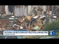 Outside church service held following fire