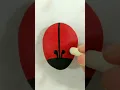Ladybug acrylic painting on stone