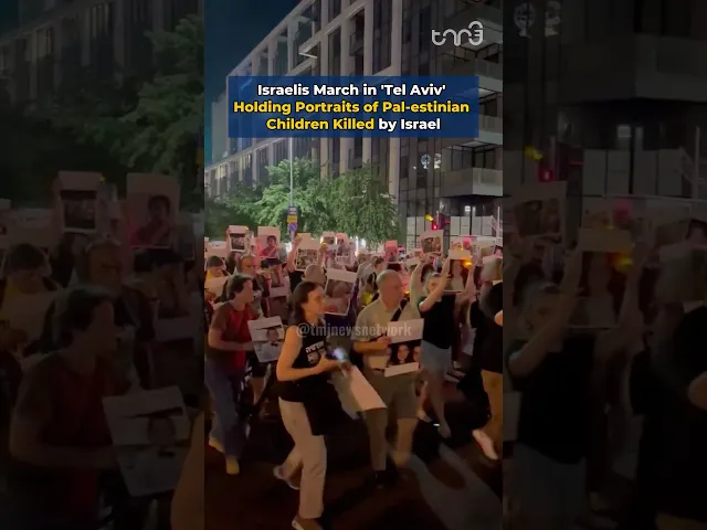 ⁣Israelis March in 'Tel Aviv' Holding Portraits of Pal-estinian Children Killed by Israel