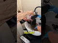 getting a scalp treatment from the FIRST scalp spa