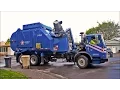 Garbage Trucks On Route In Action
