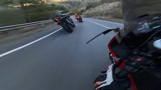 BMW s1000rr chasing an Aprilia RSV4 a Yamaha R1 and a Triumph Street Triple 765rs