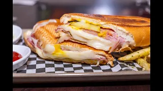Making Azucar s Cubano sandwich