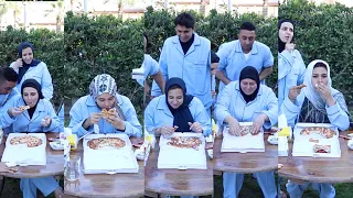 اسرع شخص هيخلص البيتزا الحار في اسرع وقت هيكسب ال10 الف جنية والعقاب في الجنينة 