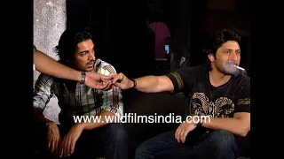 Arshad Warsi and John Abraham relax before our interview Arshad lights up and smokes John yawns