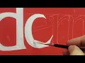 Signwriting a lower case Benguiat e by John King