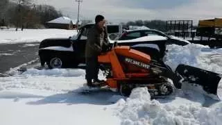 Snow plowing with Toro Dingo 525 - Mini Skid steer services in Clarksville TN