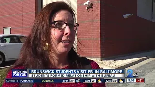 Baltimore FBI agents trade badges for gifts with special needs high school students