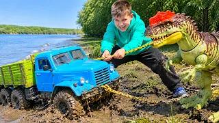 Darius saves the stuck Car and Dinosaur from the mud | People First