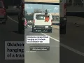 Oklahoma inmate filmed hanging out the back of a transport van