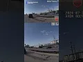 Distracted driver crashes into car nearly hits officer