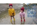 Kids Playing in Puddles