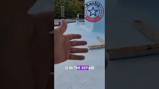 Silicone roof coating installation on a commercial flat roof.