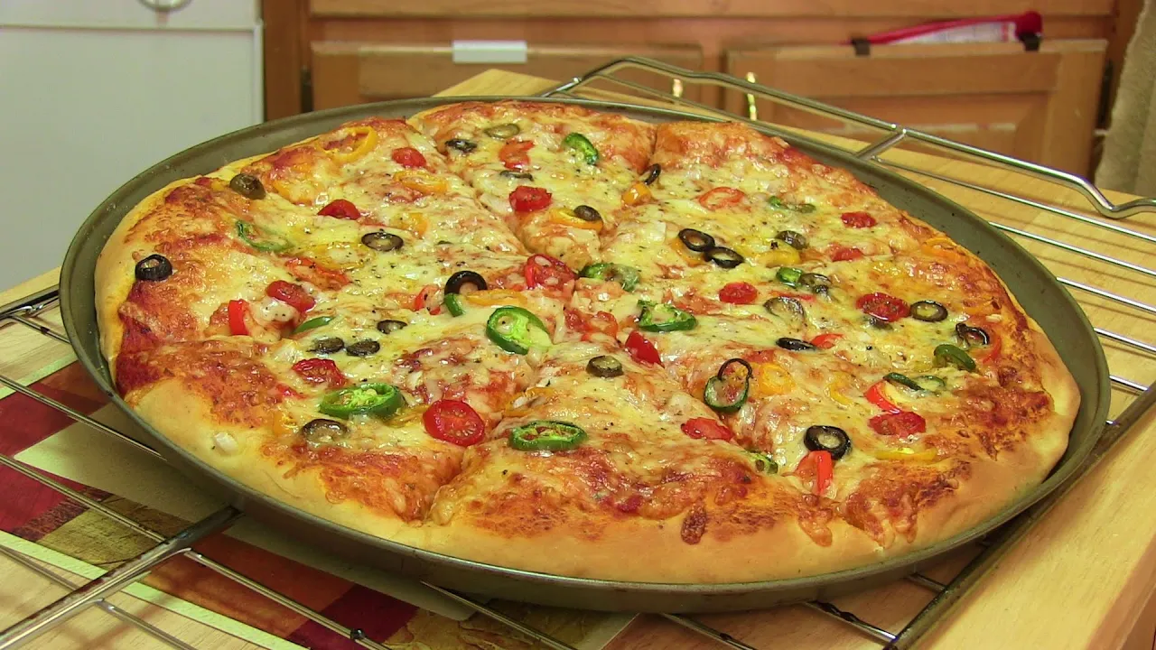 How to make Homemade Pizza From Scratch - Recipe by Laura Vitale - Laura in the Kitchen Ep. 86. 