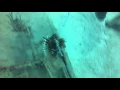 Barracuda Attacks Lionfish on the sunken wreck Porpoise in St Maarten