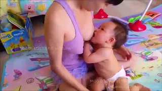 baby breastfeeding inside willy babys crib before bedtime