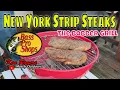 New York Strip Steaks on the Bass Pro Shops Bobber Grill