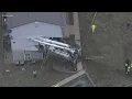 Utility truck crashes into apartment building after fatal crash on Highway 21 in Hillsboro