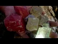 Download Lagu Red crystals are formed in volcanic caves by the sea. Gems, diamonds