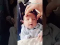 Newborn Baby Looks Relaxed While Enjoying Head Massage Shorts