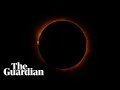 Thousands gather across Europe for a total solar eclipse - watch live