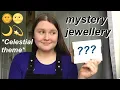 opening a mystery jewellery box from etsy celestial theme