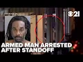 Armed standoff suspect arrested after barricading self in home following domestic incident