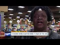 Standing wheelchair delivered to cashier with spina bifida at Canton Giant Eagle
