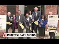 Inmates learn coding to get through The Last Mile before release
