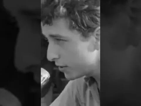 1963, Dylan attends a voter registration rally in Mississippi, performs “Only A Pawn In Their Game.”