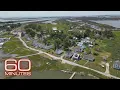 Maryland island struggles to survive impact of rising sea level erosion 60 Minutes