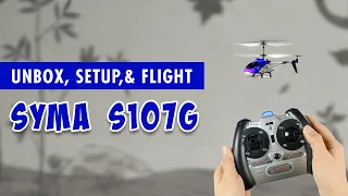unbox setup and how to fly a syma s107g for the first time