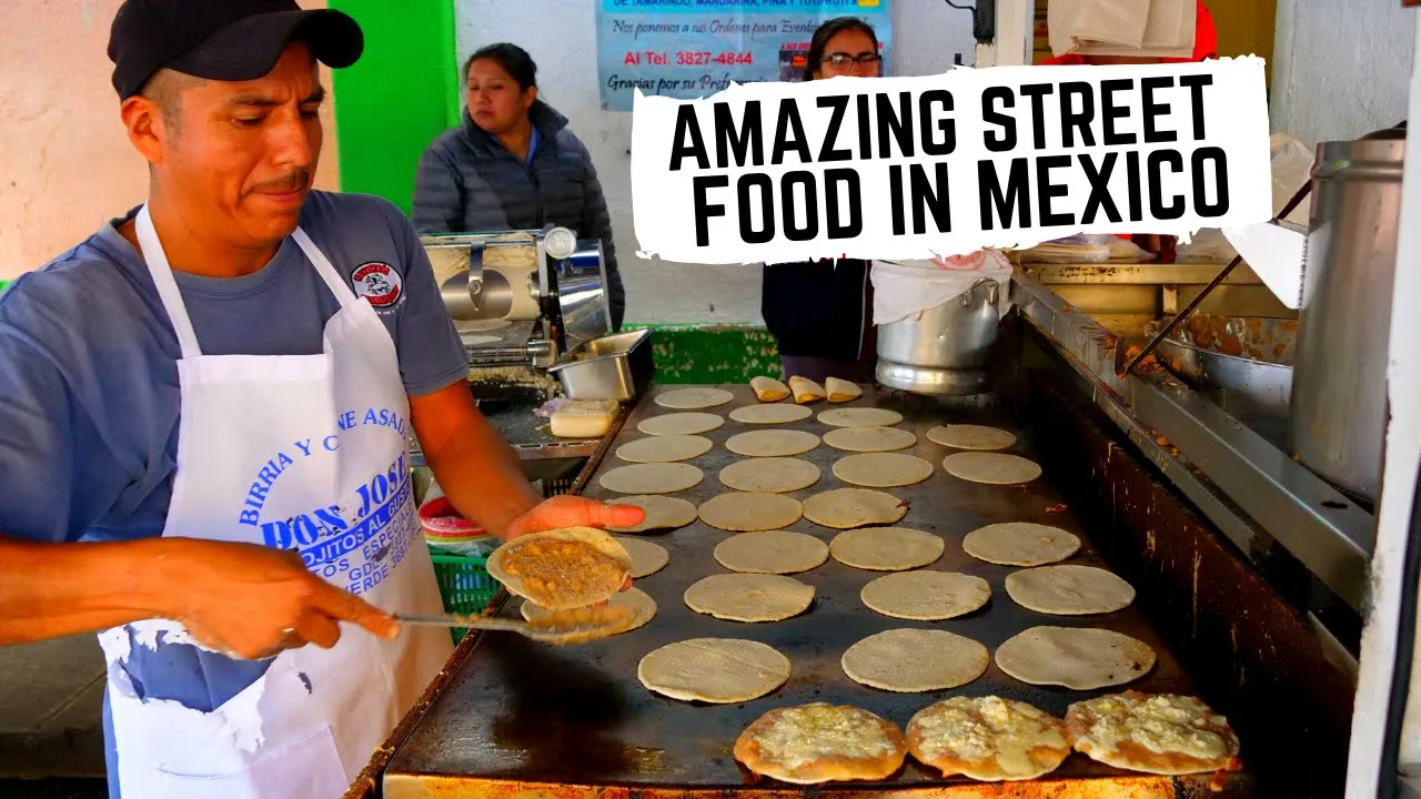 BEST MEXICAN STREET FOOD in GUADALAJARA, MEXICO | Crazy DROWNED sandwich, CHEESY tacos + BIRRIA