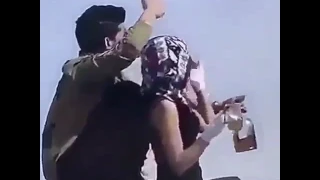 شاب بصحبة فتاة يجاهران بشرب الخمر في السعودية 