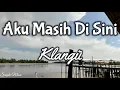 Download Lagu Aku Masih Di Sini - Klangit (Lyrics Video)