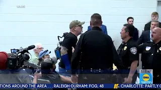 North Carolina town hall erupts in boos as congressman escorted from building, angry constituents