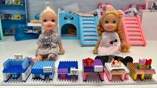 Building with blocks with Elsa and Anna toddlers and their friends part 2