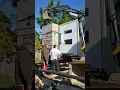 Installing Bard 2 5 Ton Wall Hung Heat Pump onto Shipping Container