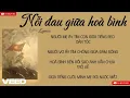 Download Lagu NỖI ĐAU GIỮA HÒA BÌNH - HÒA MINZY x NGUYỄN VĂN CHUNG | LYRICS VIDEO