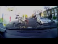 Cyclist knocked off bike by flying van door