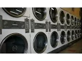 Coin Laundry Mat Closest Laundromat Near Me w Rolling Basket Cart Wash Stock Footage