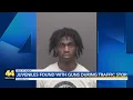 Man with felony warrant two minors with guns pulled over in Evansville