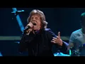 U2 and Mick Jagger perform "Stuck in a Moment You Can't Get Out Of" at the 25th Anniversary concert.