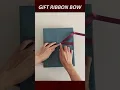 How to tie a ribbon bow on gift box